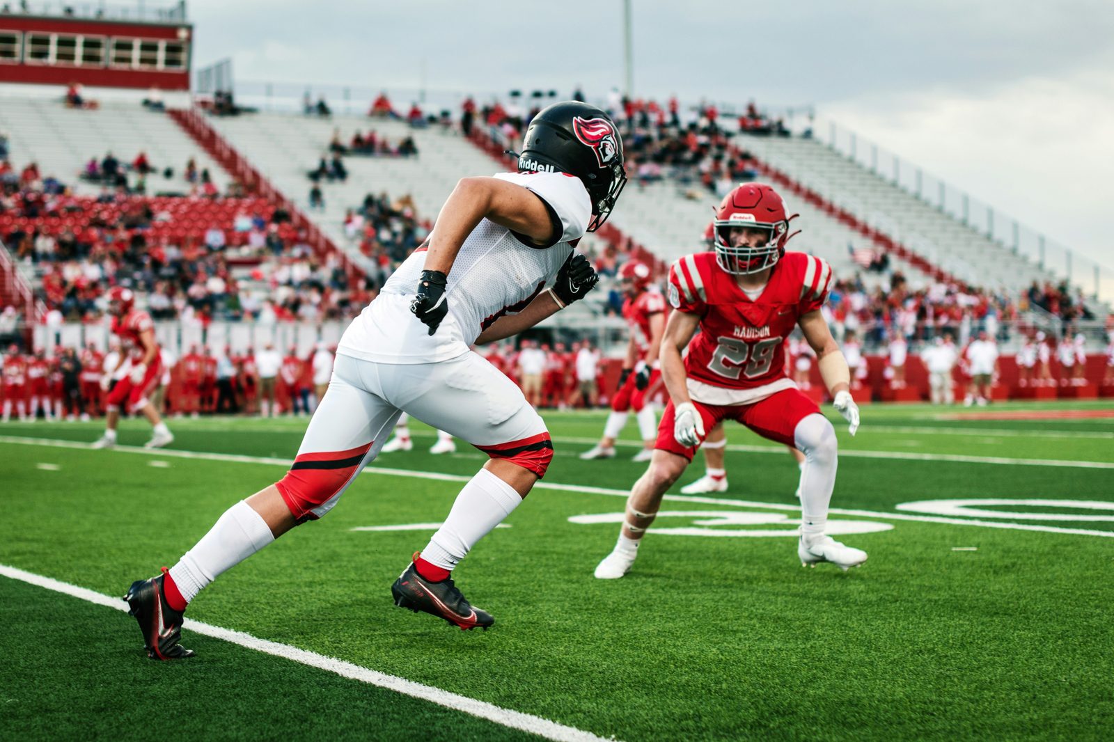 High school football game action